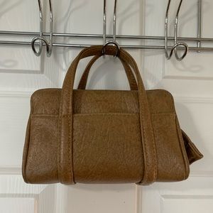 Purse: small purse. No brand, it was made.